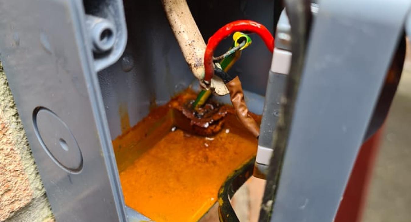 Corrosion causing electrical fault in plug socket - D Durnan Electrical Highbridge